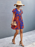 Patcute Ruffled Printed V-Neck Short Sleeve Mini Dress