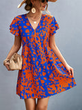 Patcute Ruffled Printed V-Neck Short Sleeve Mini Dress